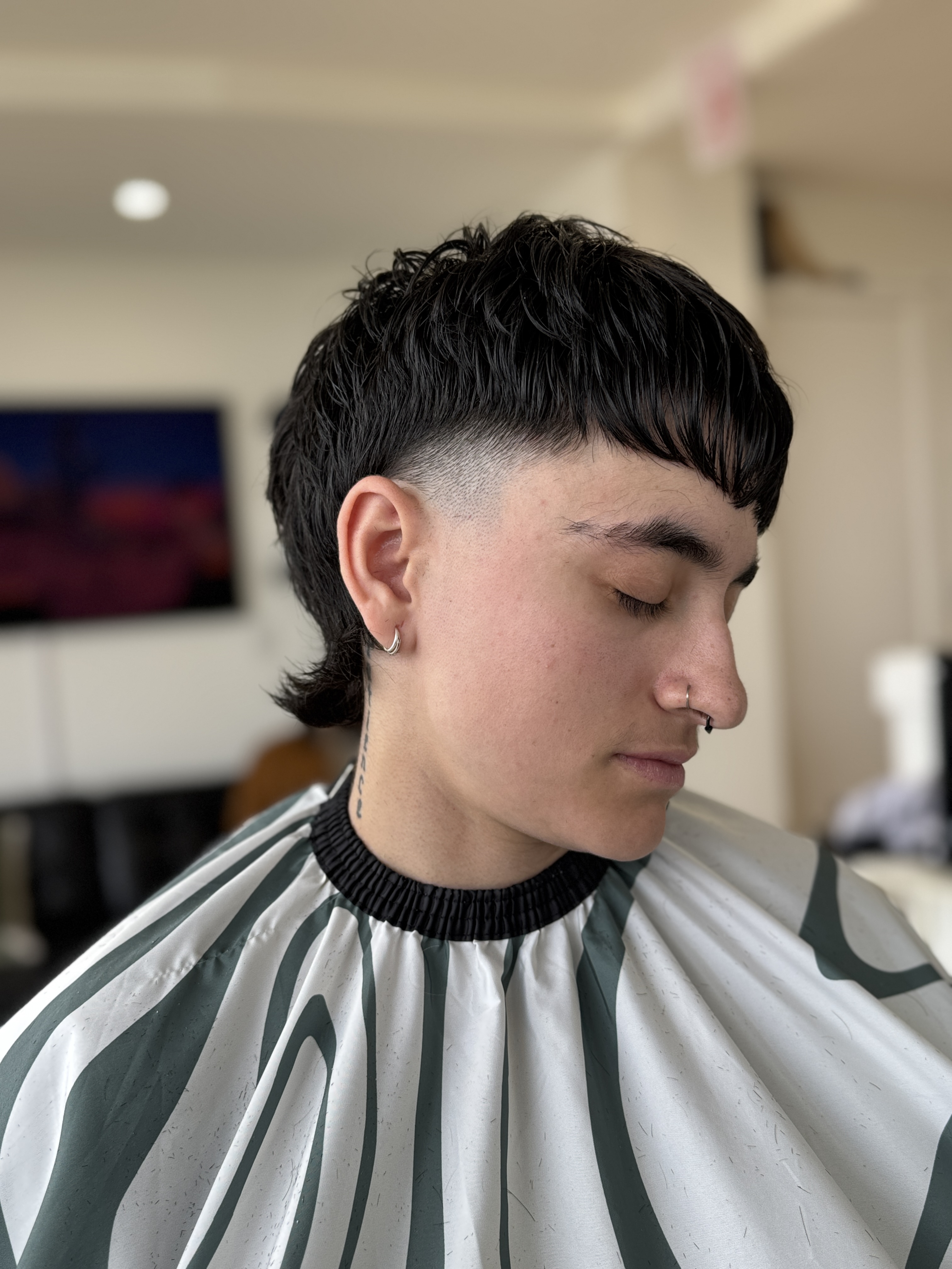 Textured curls with blended mid fade transition