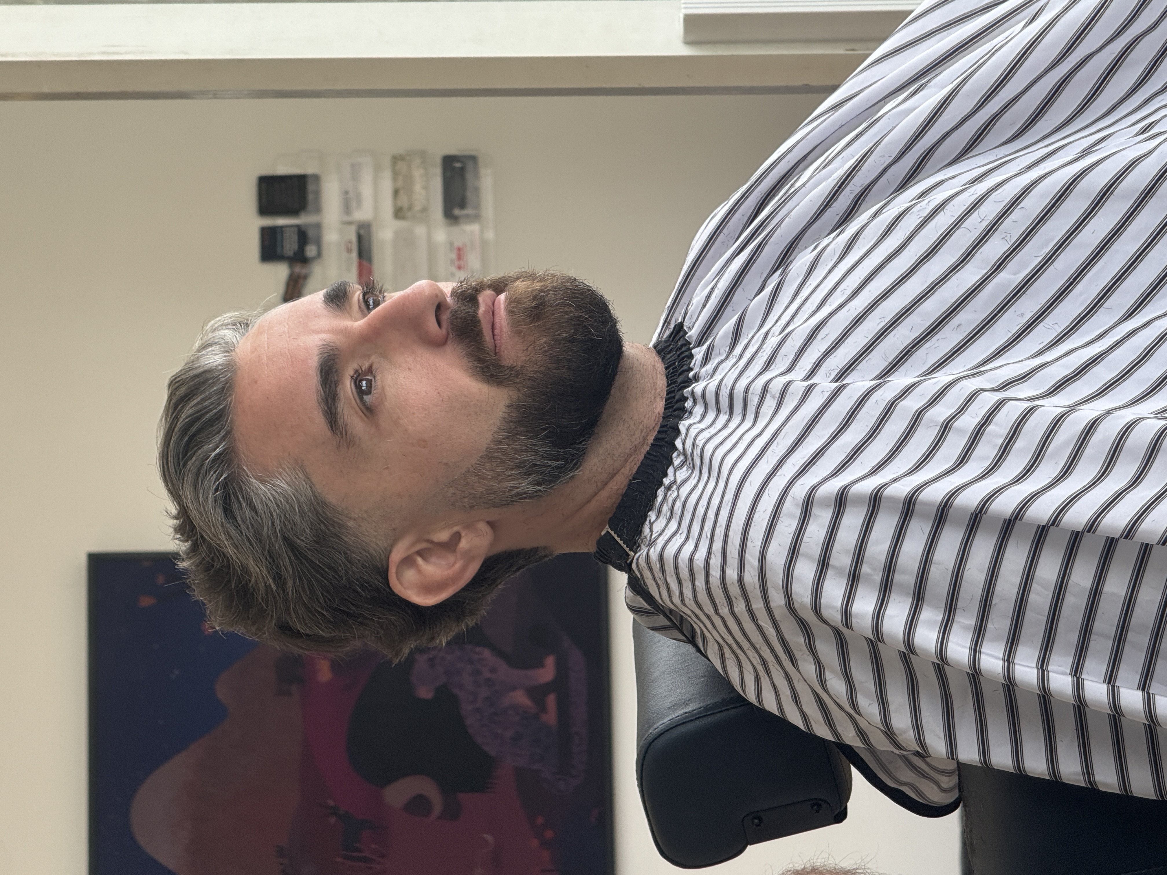 Detailed clipper work on a low skin fade